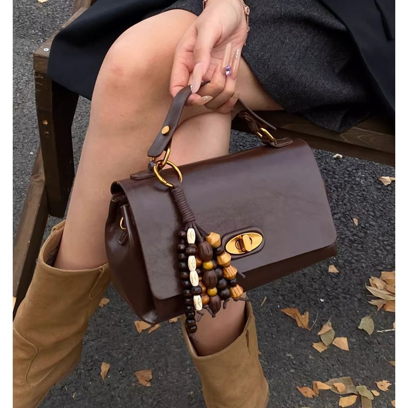 Elegant Structured Handheld Purse Bowlift