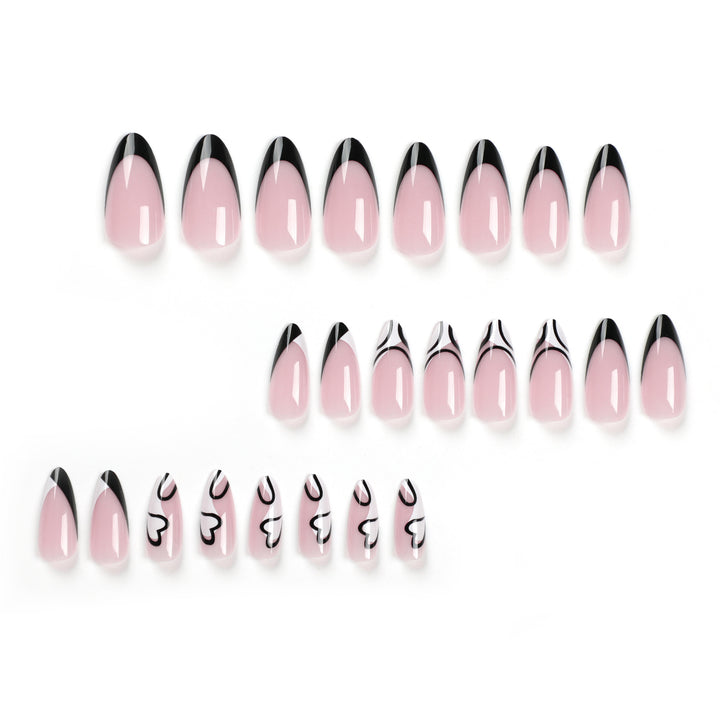 Artful stiletto nails with elegant black-and-white design Bowlift