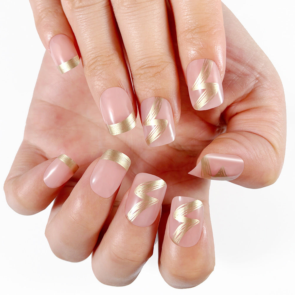Elegant French Tip Press-On Nails with Gold Accents Bowlift