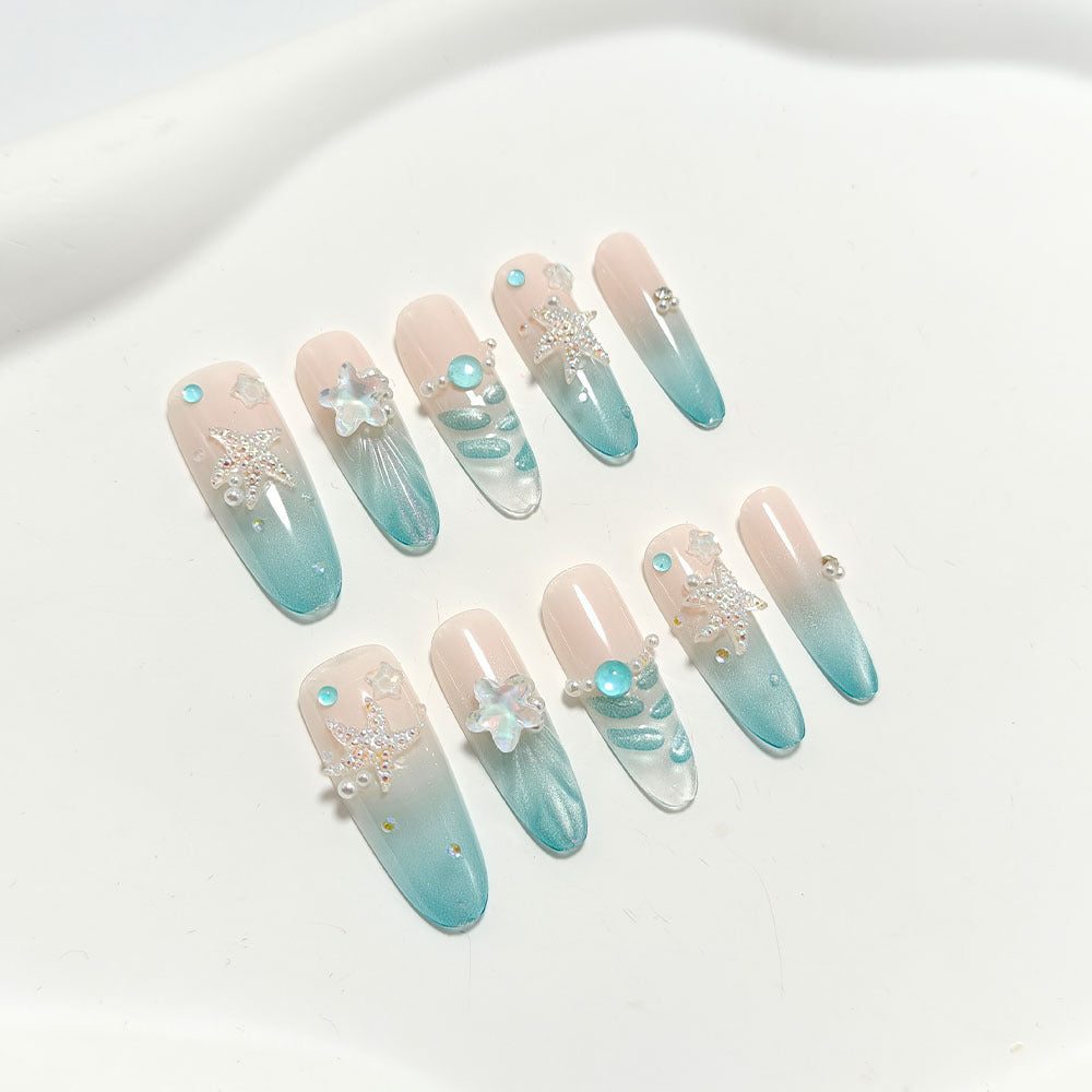 Elegant Nail Art with Ocean Theme and 3D Accents Bowlift