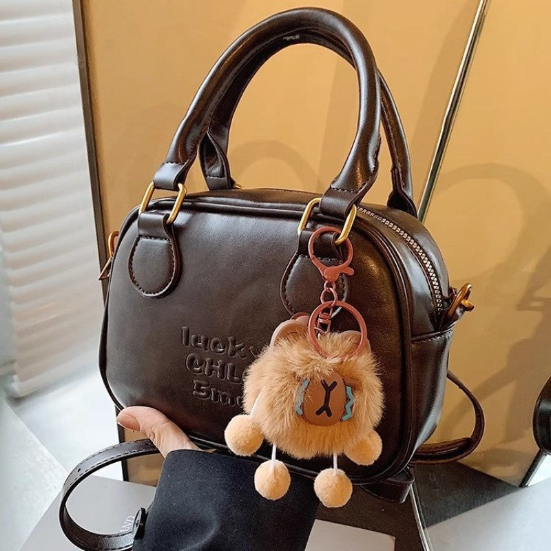 Vintage-Inspired Structured Handbag Bowlift