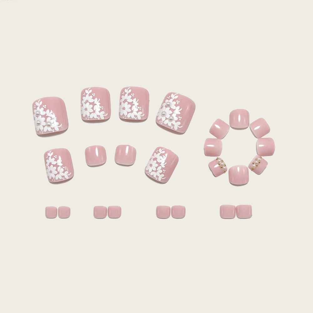 Artificial nails with delicate flower design and elegant accents Bowlift