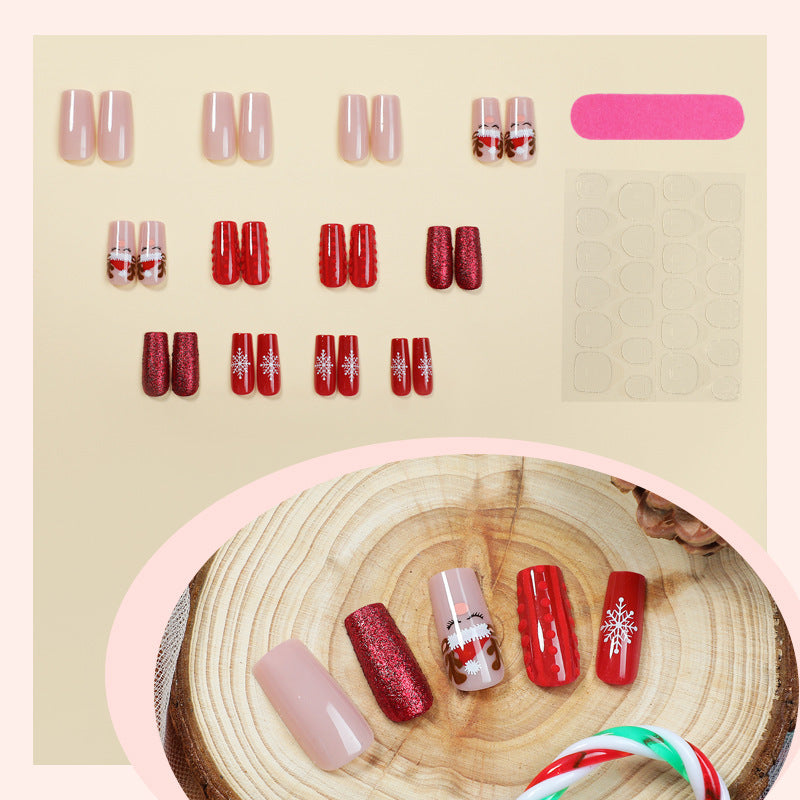Artificial nail set with festive Christmas designs and glitter accents Bowlift