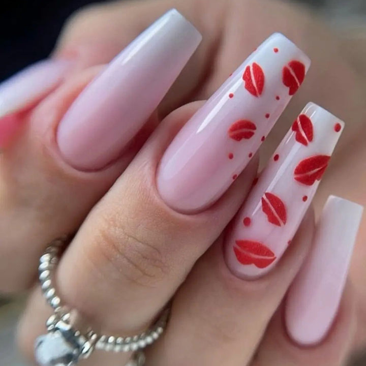 Artistic stiletto nails with lip motifs Bowlift