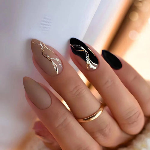 Artful nail designs with elegant gold accent Bowlift