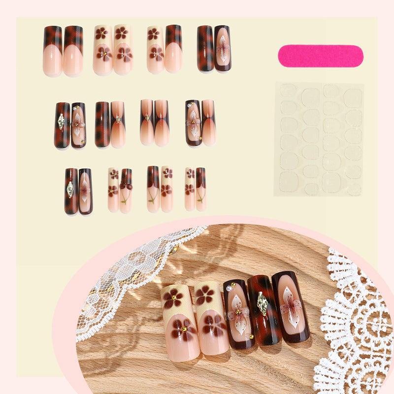 Nail set with floral accents and glitter accents Bowlift