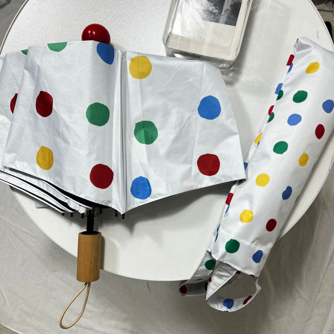 Ladies designer foldable umbrella with colorful polka dot pattern Bowlift