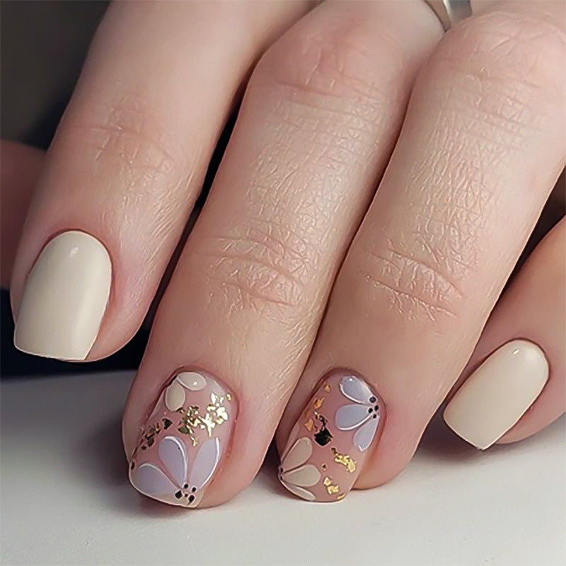 Artful nail design with floral details Bowlift