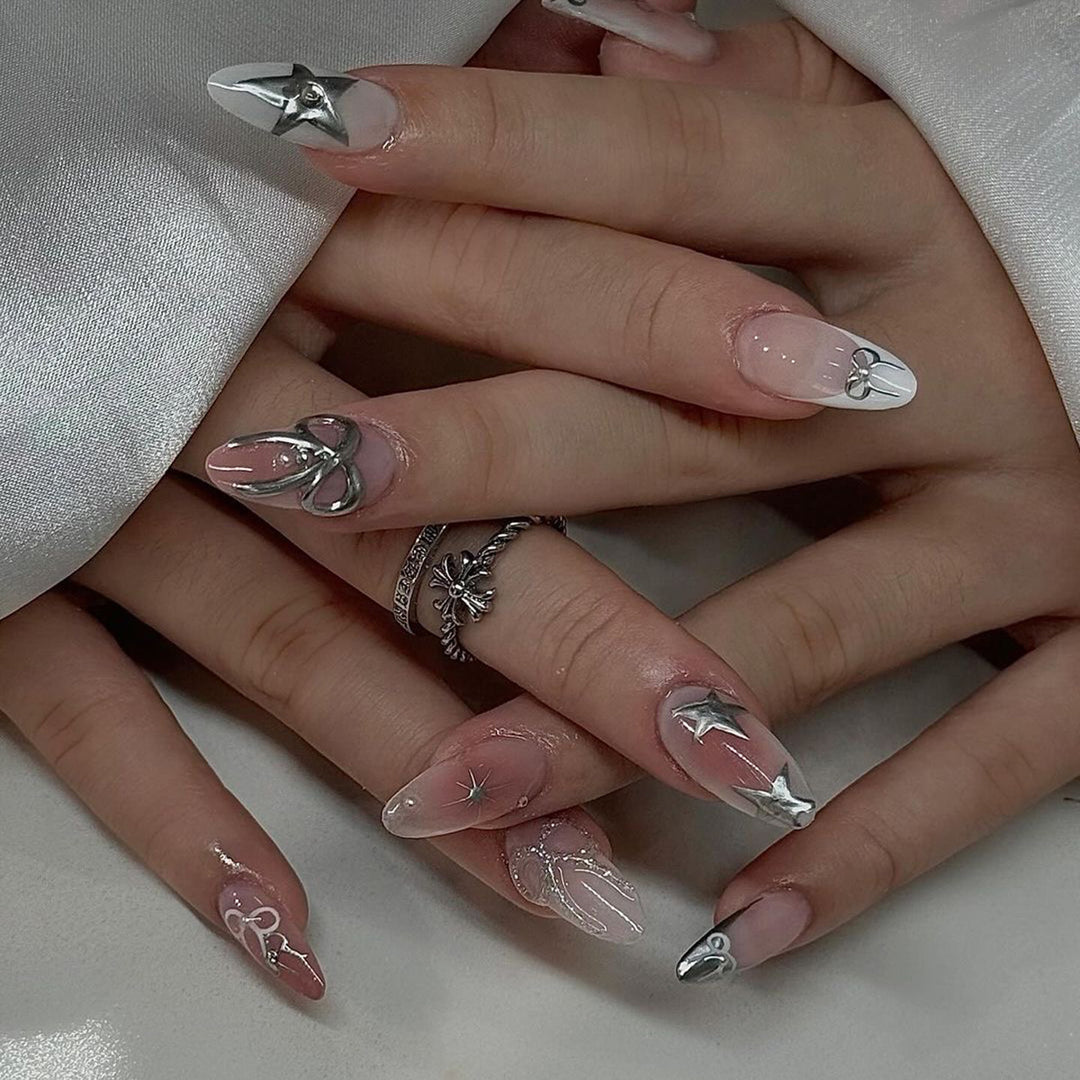 Artful nail extensions with elegant 3D embellishments Bowlift