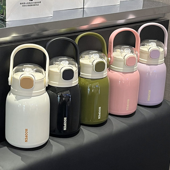 Women's insulated drinking container with practical carrying handle and cute design Bowlift