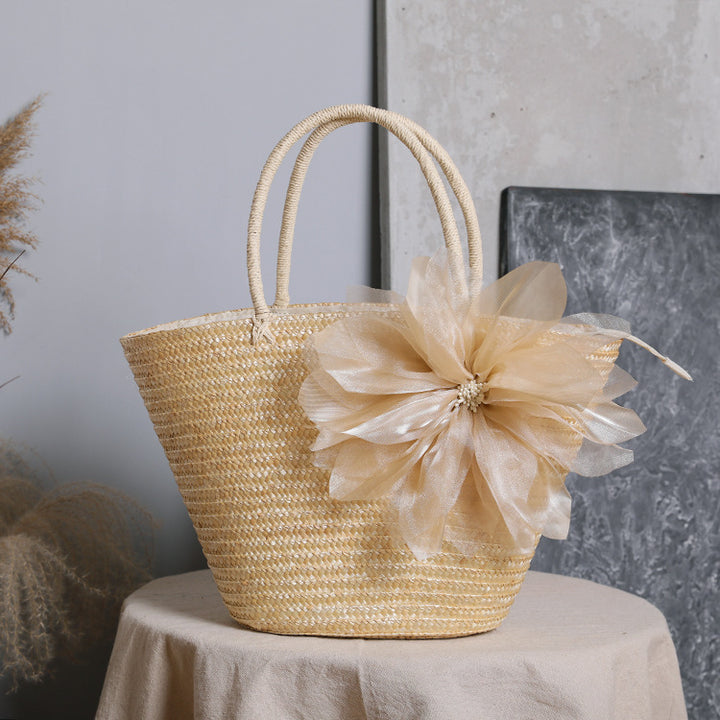 Stylish basket bag with eye-catching flower detail Bowlift