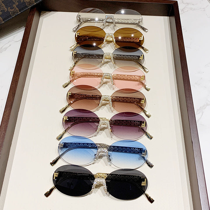 Women's sunglasses with glittering frame and oval lenses Bowlift