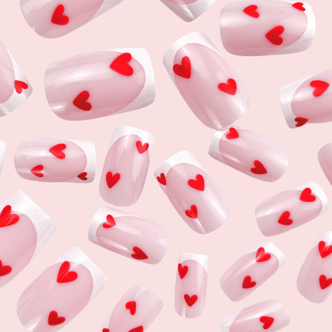 Heart-Embellished French Tip Nail Art Bowlift