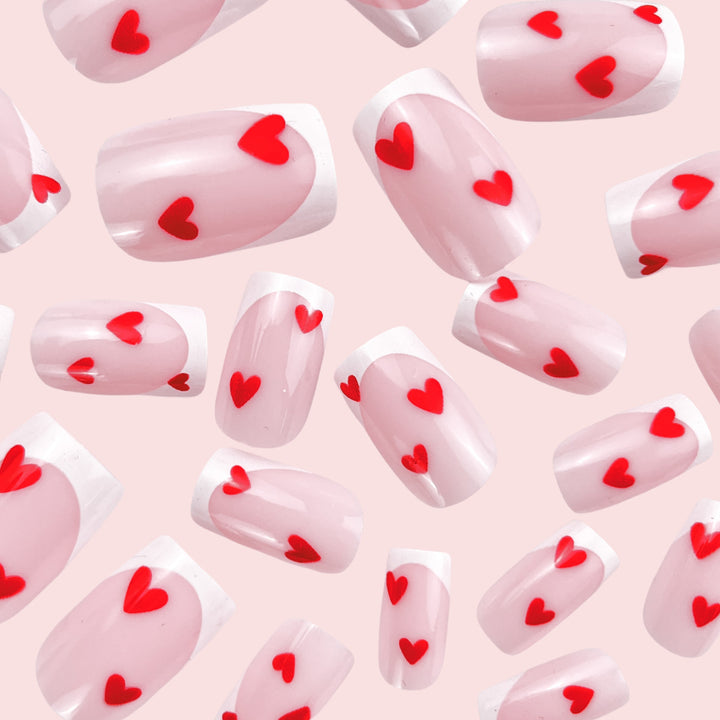 Heart-Embellished French Tip Nail Art Bowlift