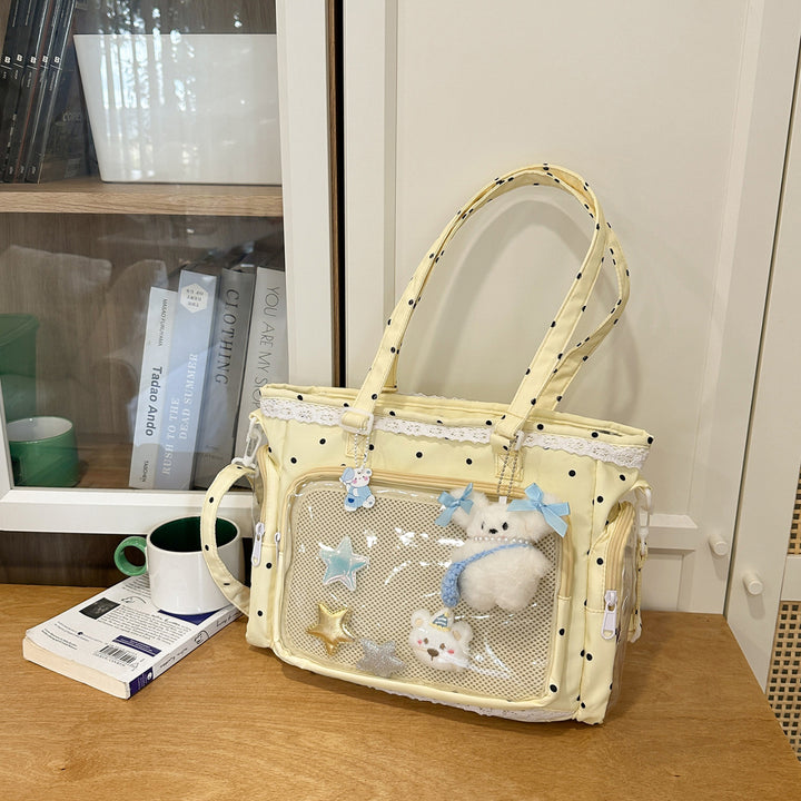 Handbag with Transparent Compartment Division and Playful Application Design Bowlift