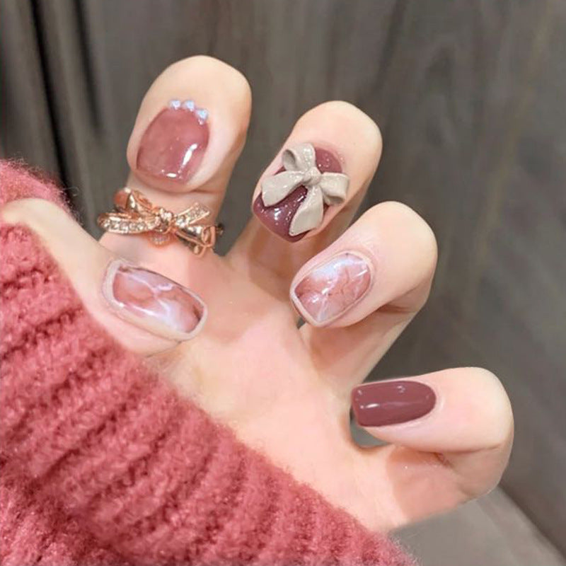 Artful nail art with luxurious 3D bows and elegant accents Bowlift