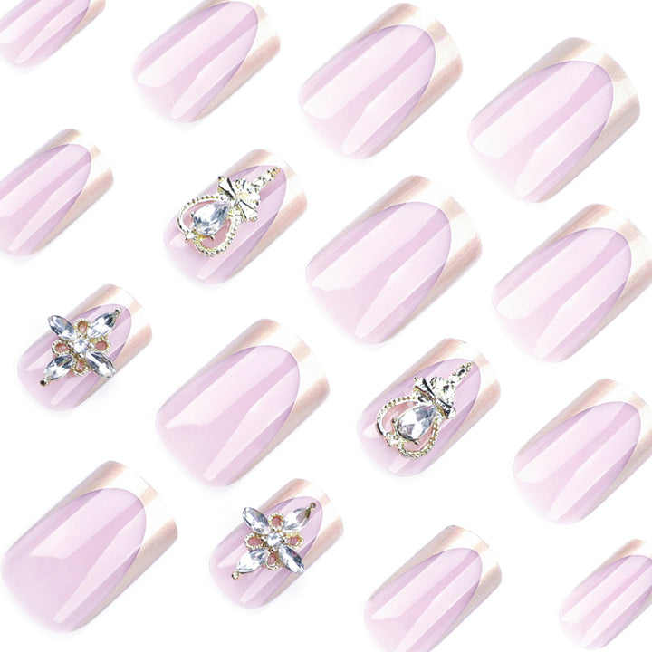 Artful Nail Extensions with Gold Accents Bowlift