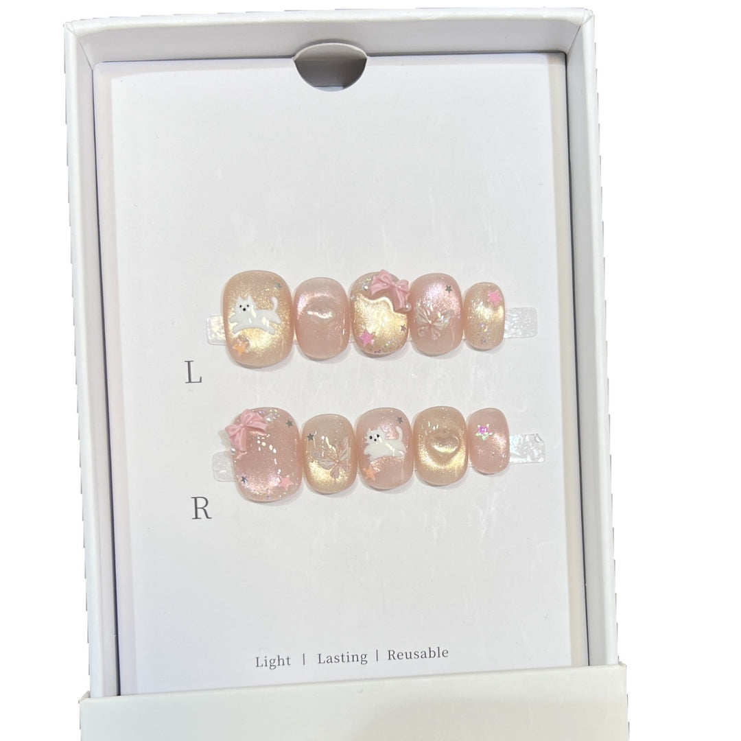 Whimsical Press-On Nail Art Set with Playful Character Designs Bowlift