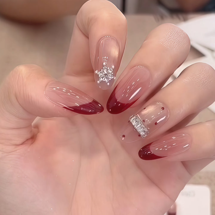 Artificial nails with festive design and rhinestone details Bowlift