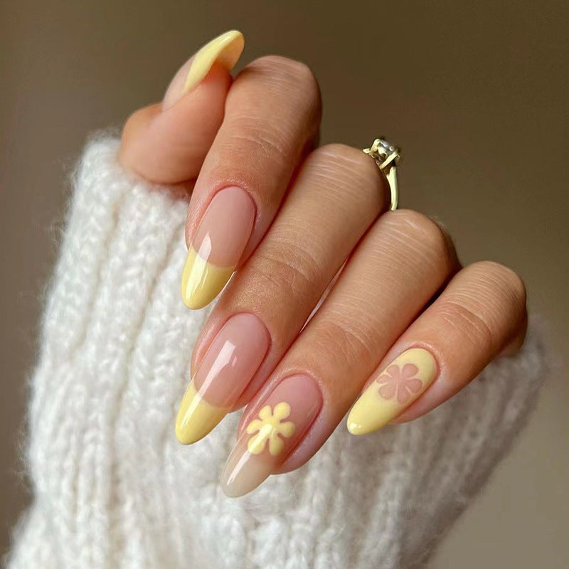 Artful nail designs with floral accents and gradient Bowlift