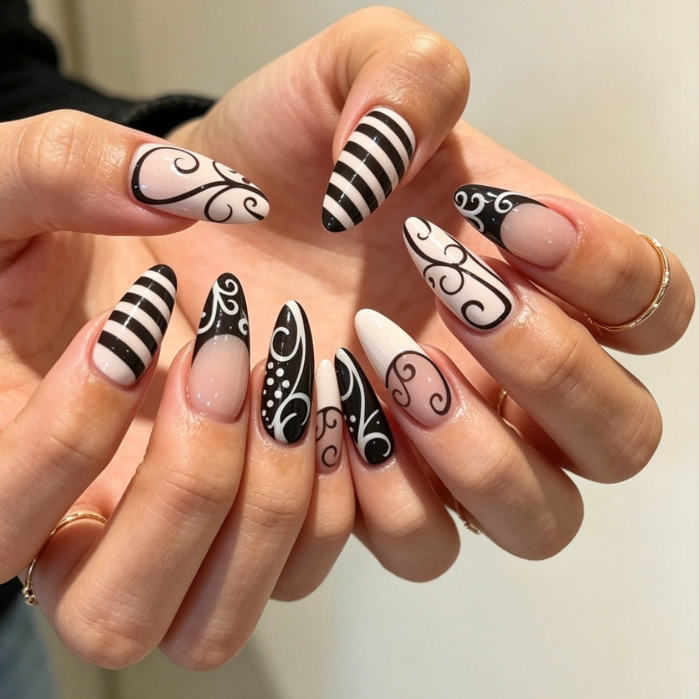 Artificial nails with modern night motif Bowlift