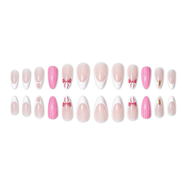 Elegant Stiletto Nail Art Enhancements with Decorative Accents Bowlift