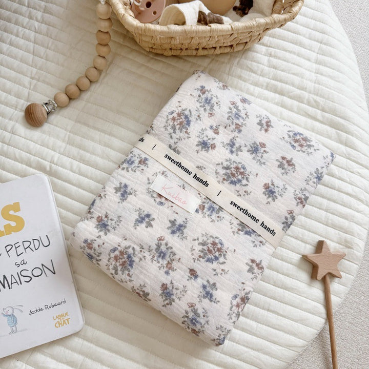 Unisex Muslin Blanket with delicate floral design and elegant ruffles Bowlift
