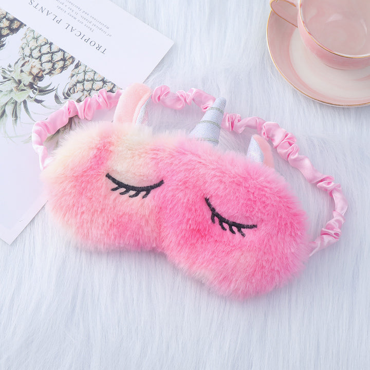 Women's plush-filled unicorn sleep mask with 3D horn, embroidered eyelashes and adjustable satin band Bowlift
