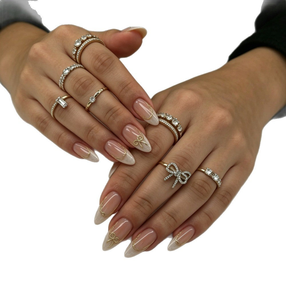 Artificial nails with Elegant French Design and Golden Decorations Bowlift