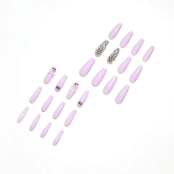 Artistic Stiletto Nails with Glitter and Flower Decorations Bowlift