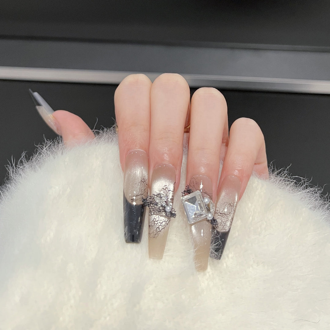 Artistic Press-On Nail Set with Unique Lace and Gemstone Accents Bowlift