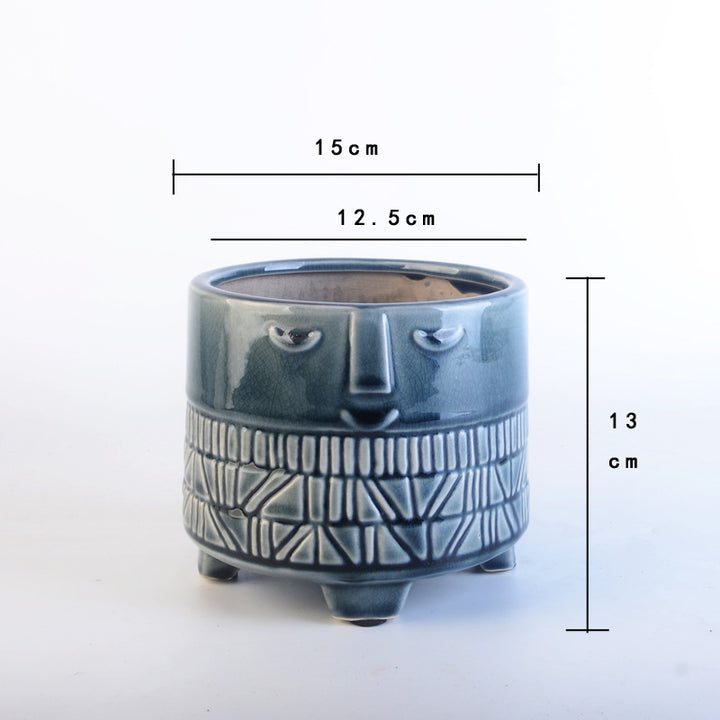 Decorative plant pot with facial features Bowlift