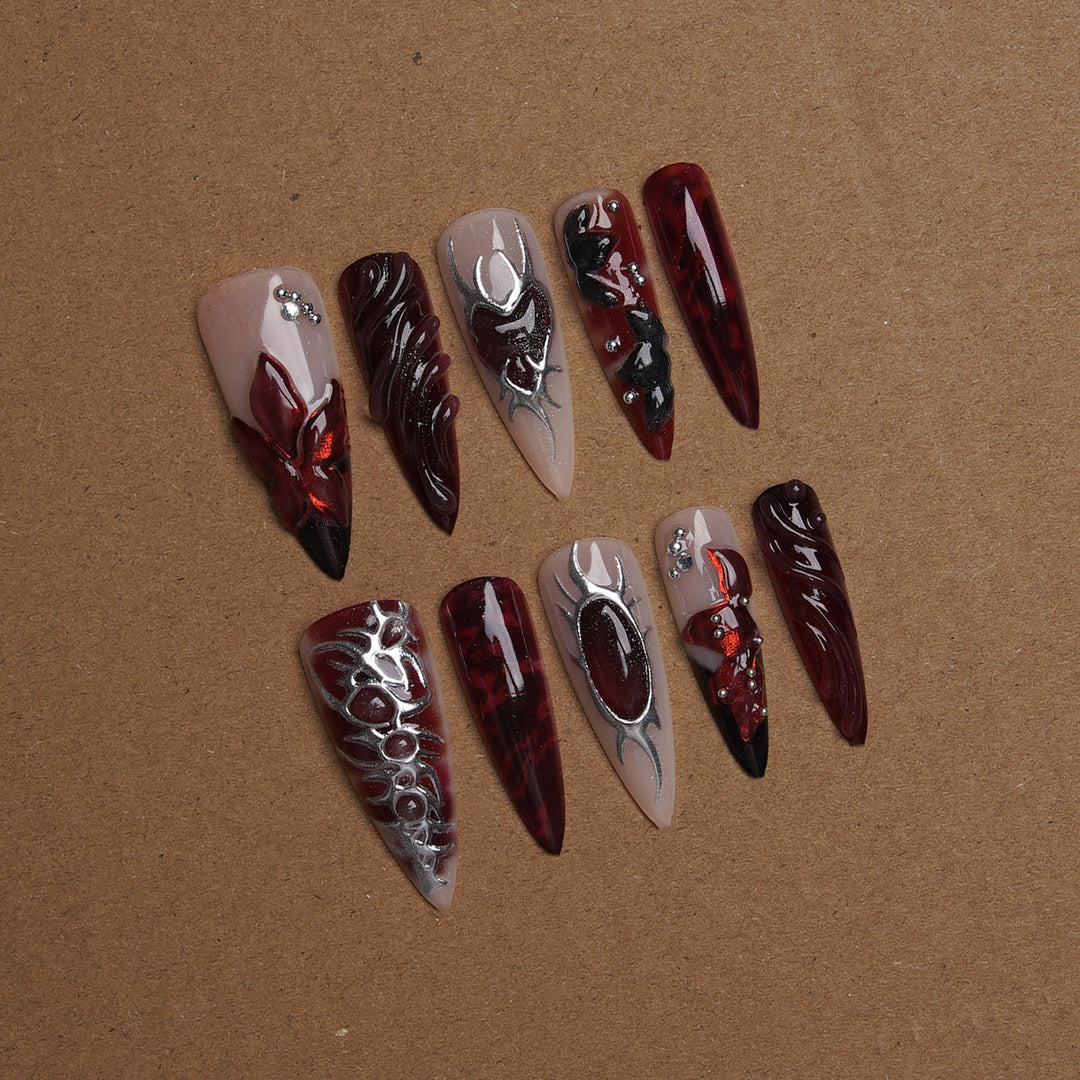 Acrylic nail set with artistic designs Bowlift