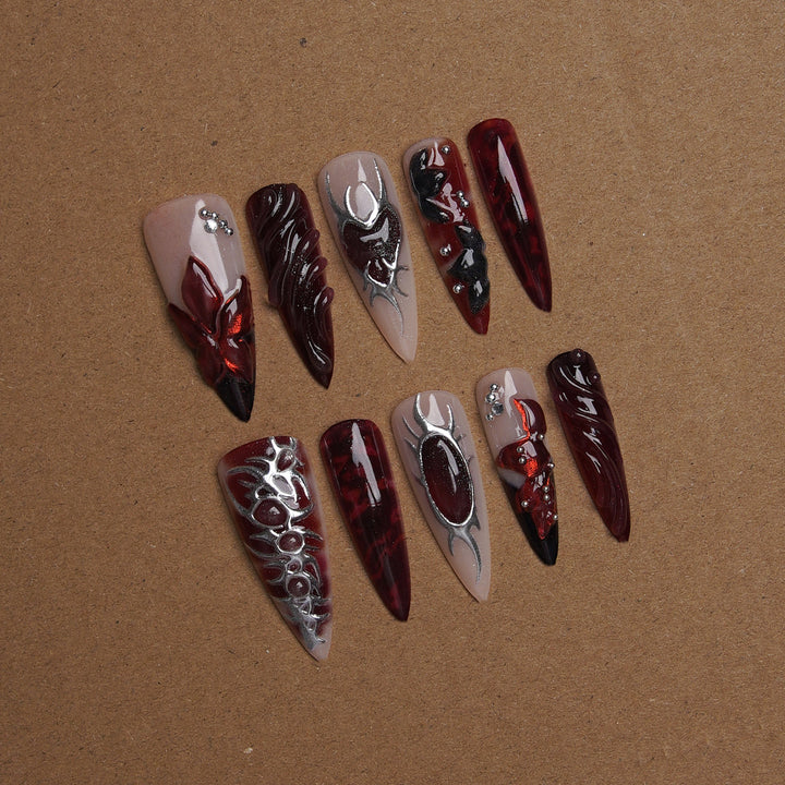 Acrylic nail set with artistic designs Bowlift