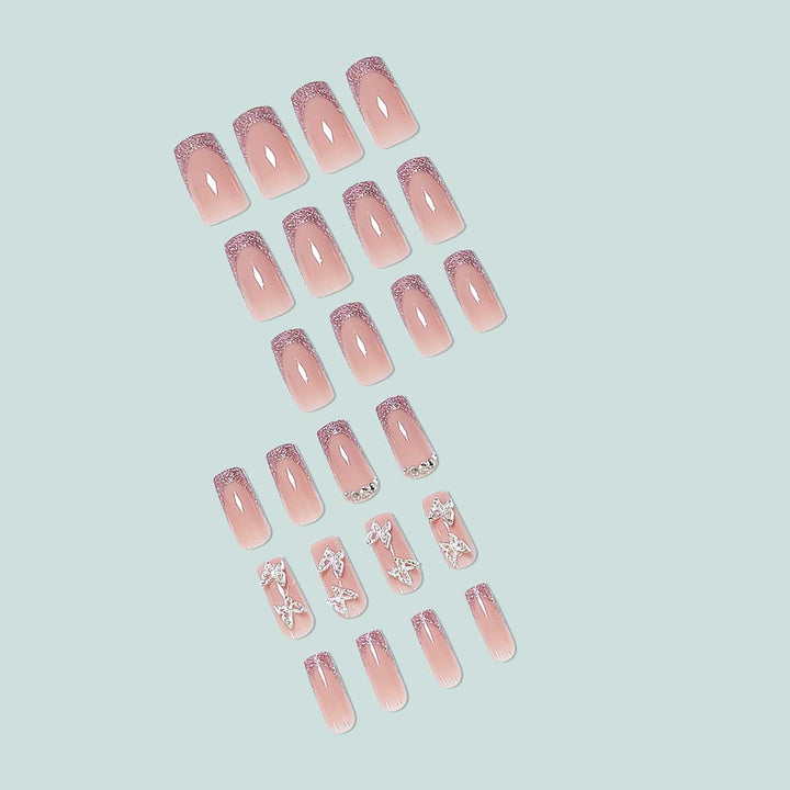 Glamorous stiletto artificial nails with glitter and crystal elements Bowlift
