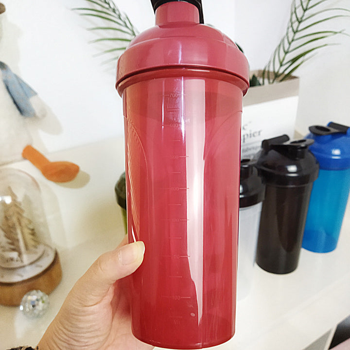 Unisex Shaker bottle in a timeless design with practical pouring opening Bowlift