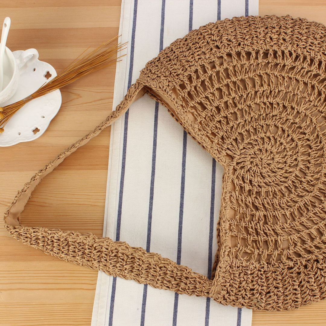 Hand-knotted tote bag with intricate wave pattern Bowlift
