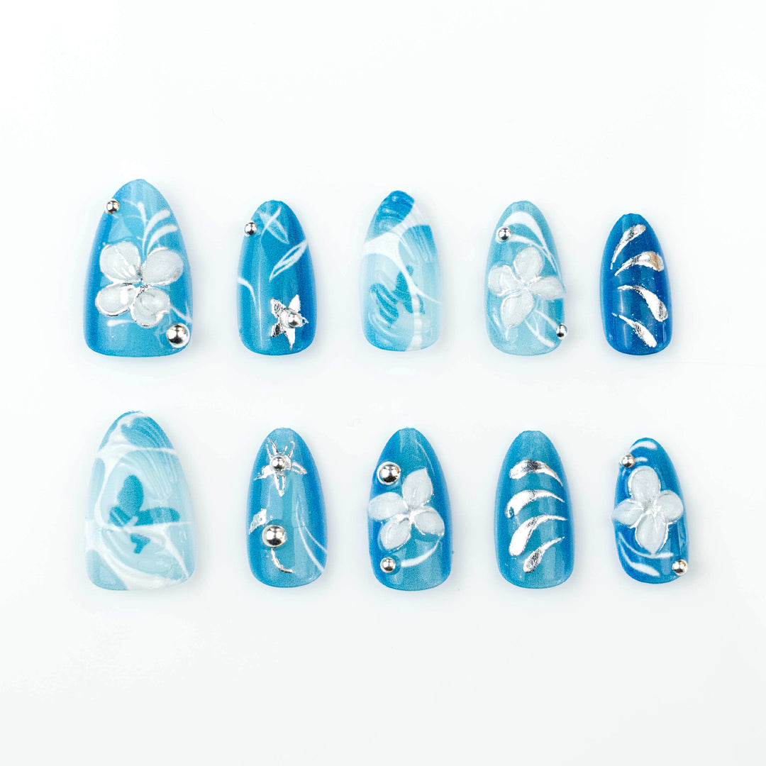 Artificial nail set with floral accents and elegant glitter elements Bowlift