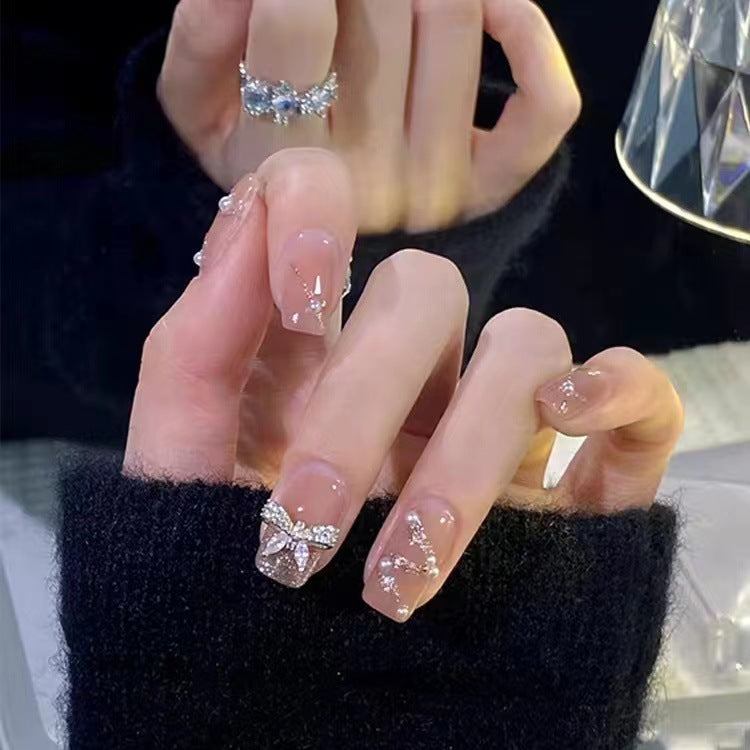 Glamorous glitter artificial nails with butterfly element Bowlift