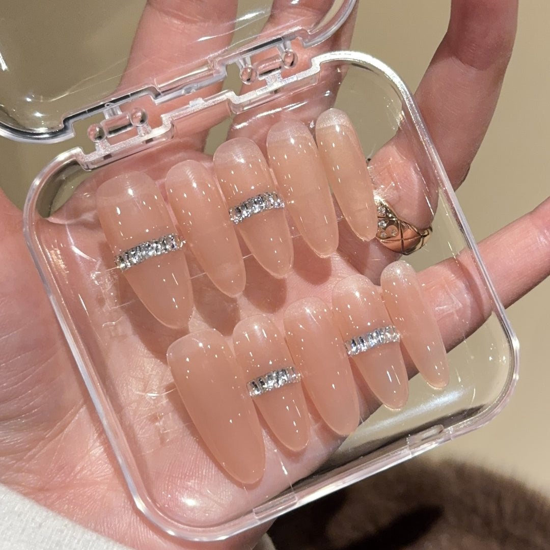 Glamorous artificial nails with rhinestones Bowlift