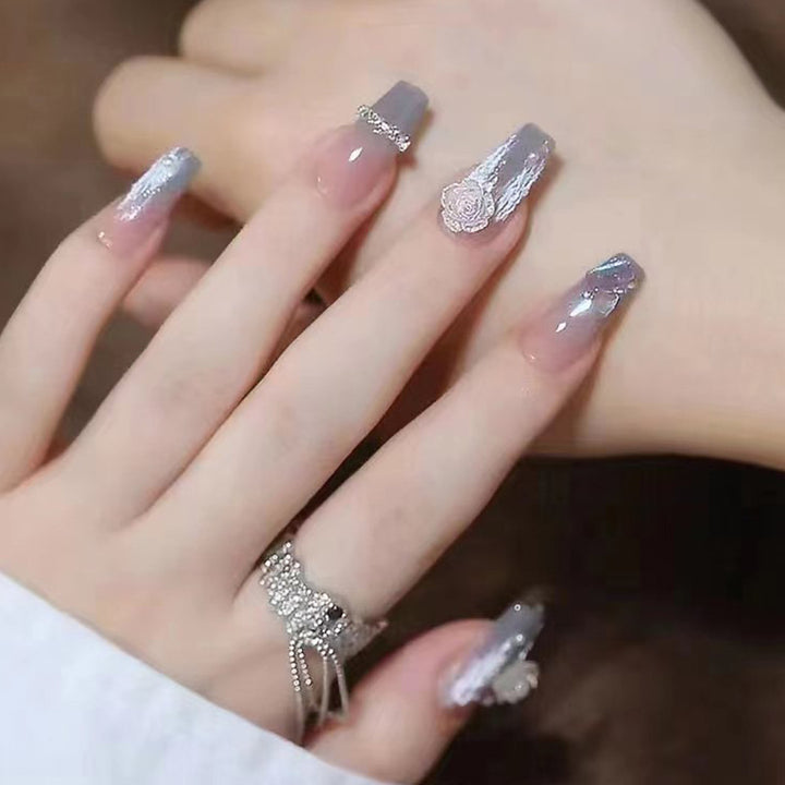Artificial nail set with delicate rose and glitter decorations Bowlift