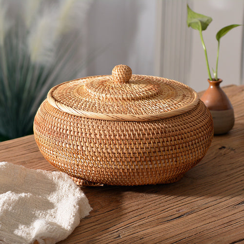 Women's round storage basket made of woven natural material Bowlift