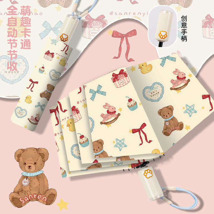 Women's folding umbrella with automatic opening mechanism and playfully themed design Bowlift