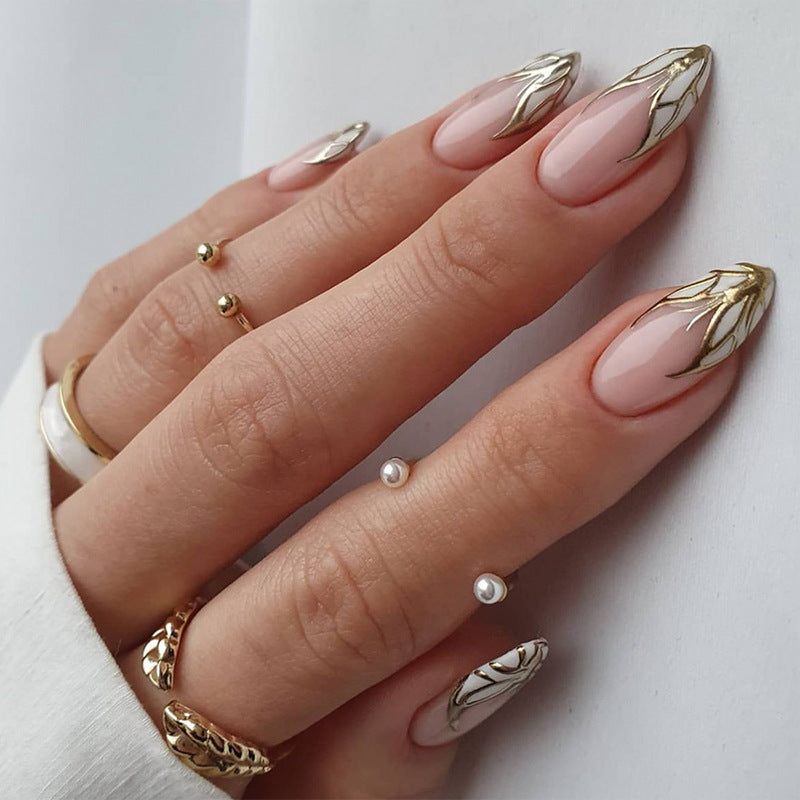 Artful stiletto nails with heart-shaped accents Bowlift