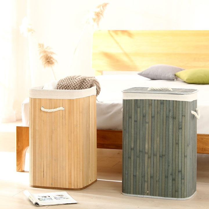 Laundry basket made of natural bamboo by Bowlift