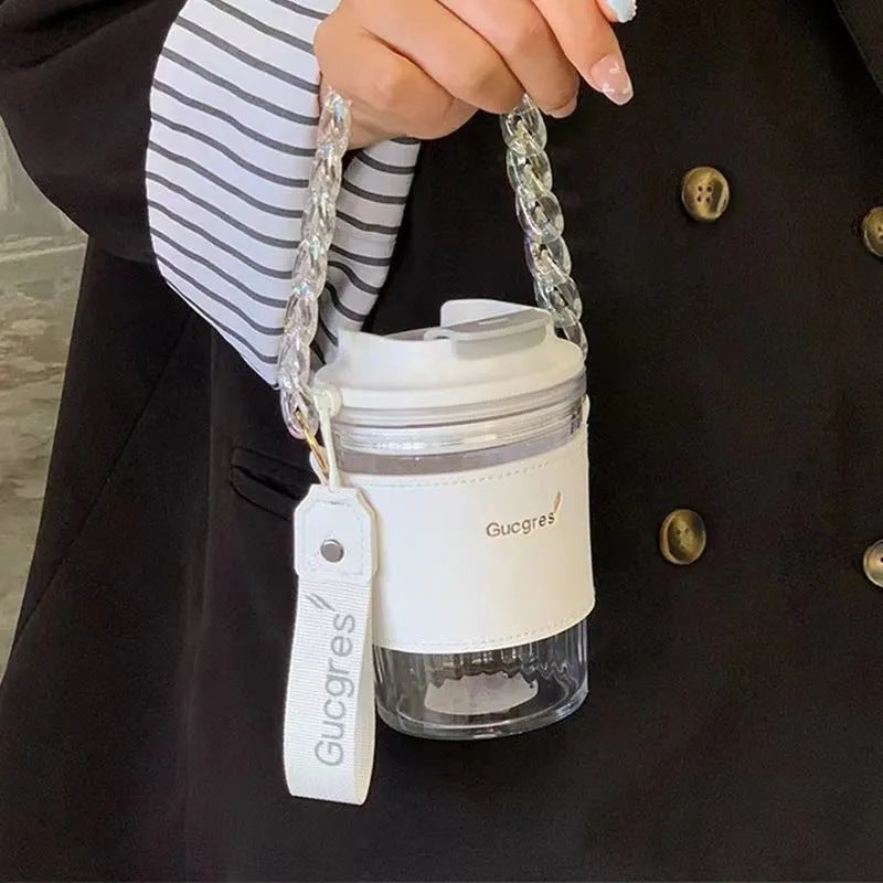 Women's coffee and tea mug with practical carrying handle Bowlift