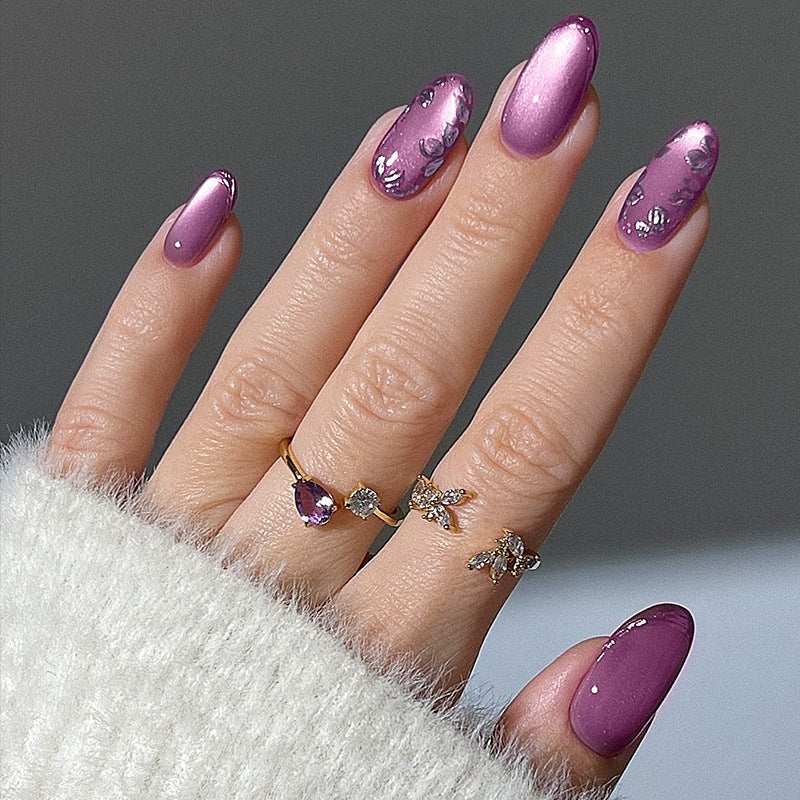 Elegant artificial nail set with shimmering accents and decorative designs Bowlift