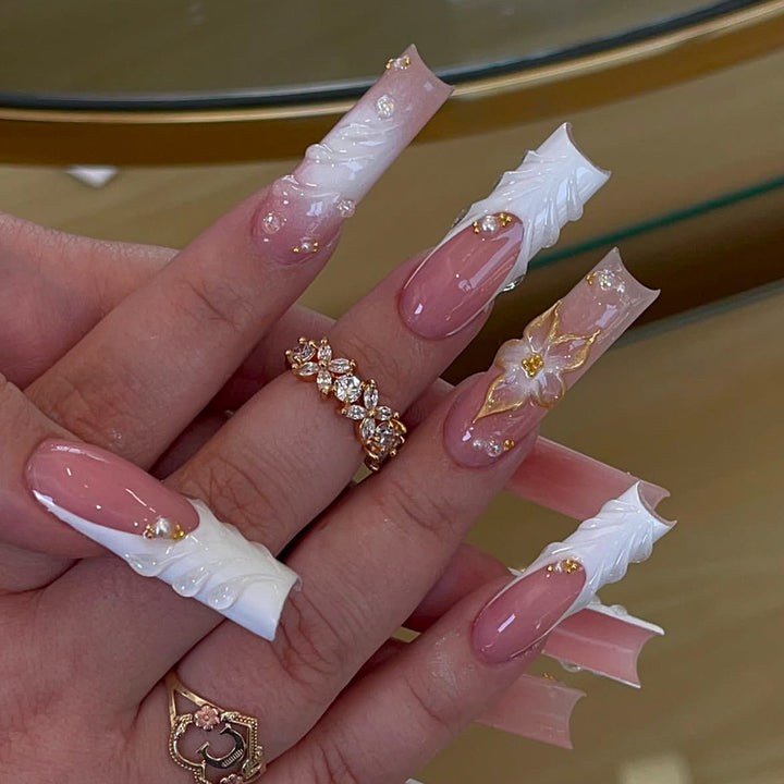 Artificial nails with handcrafted floral accents Bowlift