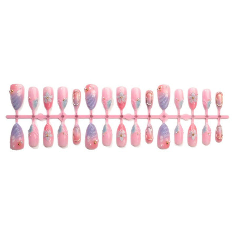 Artificial nails with flower pattern and glamorous accents Bowlift