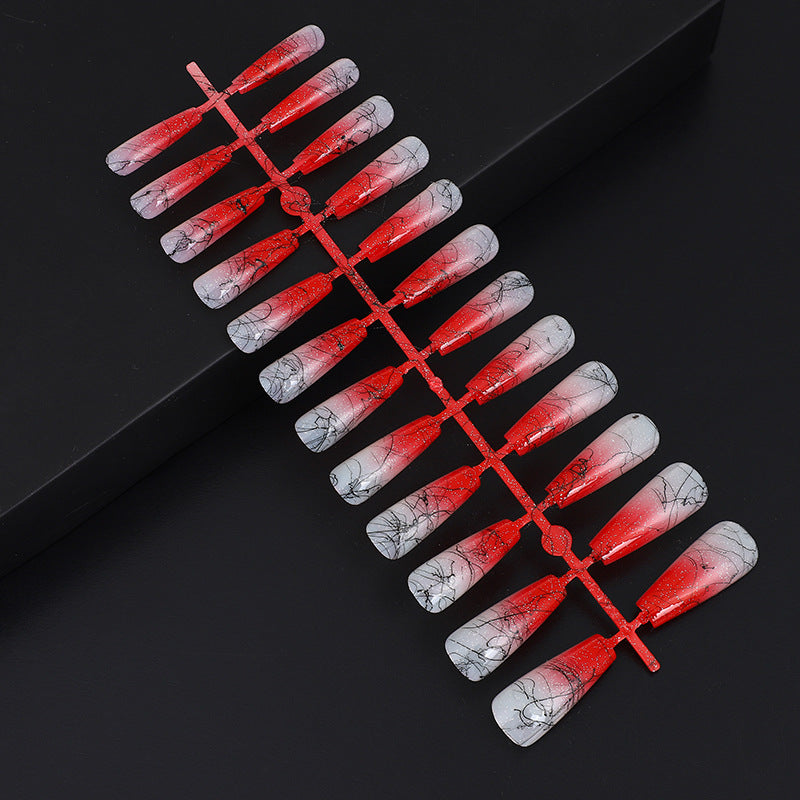 Artificial nails in modern ombre design with marbled accents Bowlift